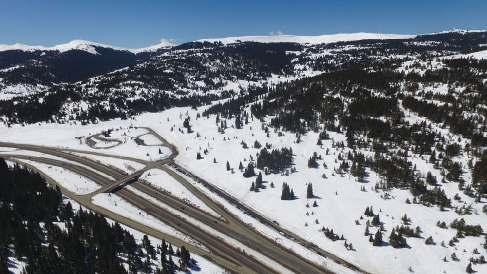 Aerial view of snowy mountains in Vail Pass, CO